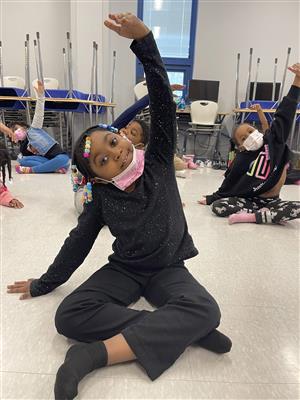 Triangle with arm up