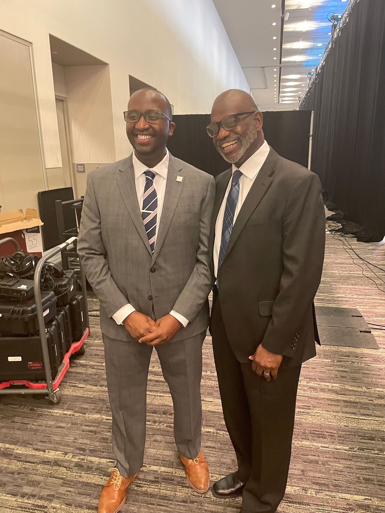  CEO Warren Morgan greets his father, Warren Morgan Sr.,  after his State of the Schools Address