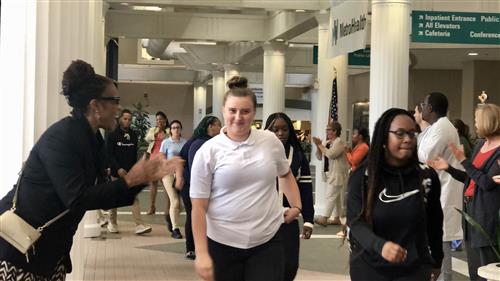 MetroHealth Staff Cheers On Lincoln-West Students as they enter the building 